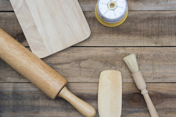 Bakery And Cooking Tools with kitchen timer on wood table