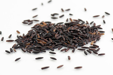 Pile Of Black Rice Closeup Shot On White Background