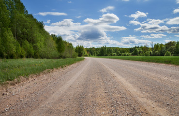 Fototapeta na wymiar Gravel road in countryside.