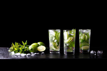 Mojito summer party refreshing tropical cocktail non alcohol drink in glass with soda water