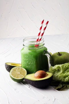 Healthy green smoothie and ingredients - detox, diet, health, ve