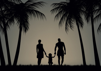 Father, mother and daughter on the beach.