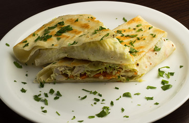 Pita bread wrapped with cottage cheese and vegetables