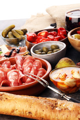 spanish tapas and sangria on wooden table - mediterran antipasti