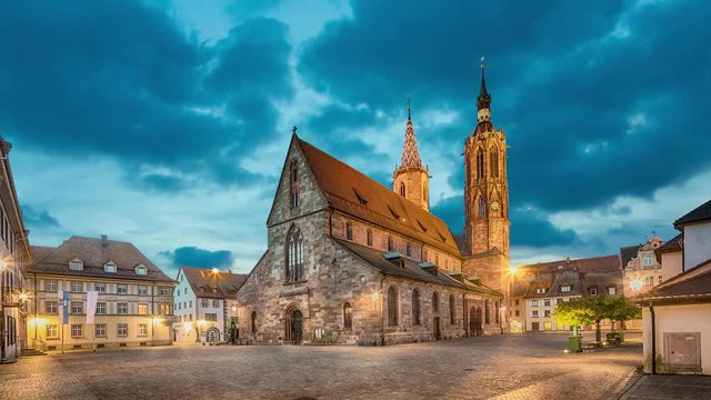 Catolic cathedral on munsterplatz square in Villingen-Schwenningen at dusk, Germany  (static image with animated sky)
