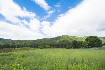 Beautiful landscape of Takayama mura at sunny summer or spring day and blue sky in Kamitakai District in northeast Nagano Prefecture Japan.