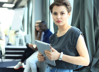 Modern business woman in the office with copy space.