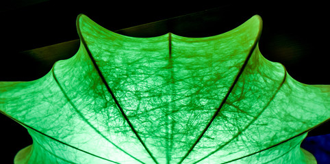 Lighting umbrella shape from small lamps at night
