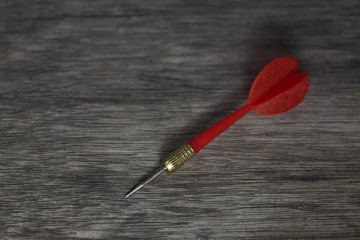 red dart on the wooden