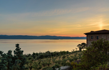 Fototapeta premium sunrise at Trasimeno lake from Castiglione del lago, umbria, italy