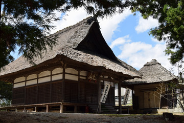 Fototapeta na wymiar thatched roof shrine,Yamanashi, Japan