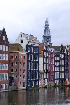dutch canalside houses with church spire