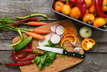 Vegetables for salad. Vegetable marrows, pepper, onions, parsley.