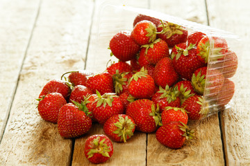 Strawberries on wooden table