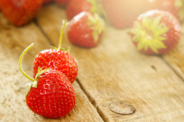 Strawberries on wooden table
