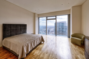 Modern interior of a bedroom in the new house.
