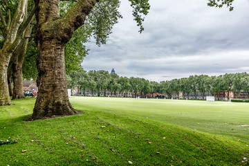 View of a large green park in the middle of a residential area of London