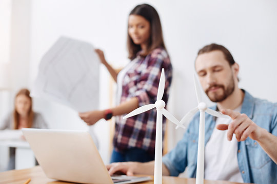 Hardworking brilliant engineer making wind turbines samples