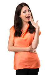 Beautiful young girl making surprise gesture