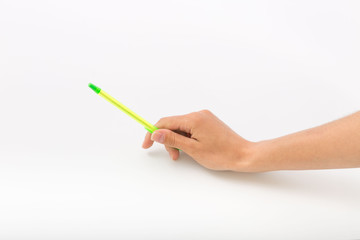 Female hands on a white background with a pen