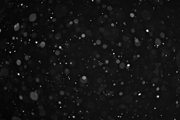 snow on a black background texture overlay bokeh highlights