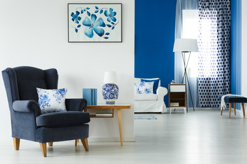 Living room with stylish furniture - obrazy, fototapety, plakaty