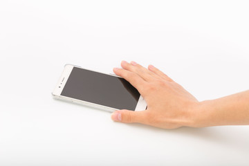 Female hands on a white background with a phone.