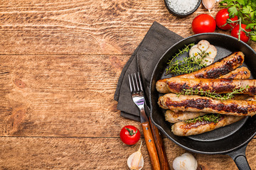 Grilled sausages with sauce