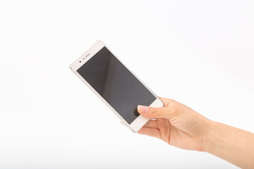Female hands on a white background with a phone.
