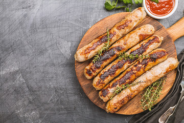 Grilled sausages with sauce