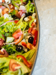 Salad plate is placed on the tray ice.
