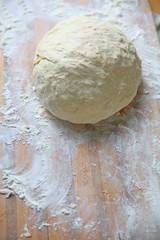 Yeast dough on a floured cutting board