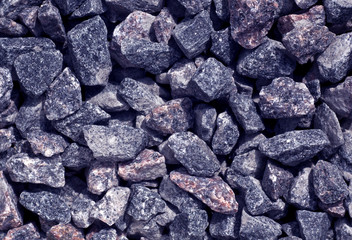 Blue toned gravel pile texture.