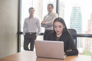 Asian businesswoman using laptop for work, Portrait business concept, 20-30 year old.