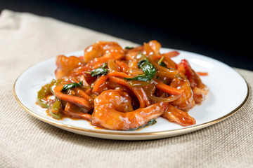 wok fried chicken stir fry with sweet peppers and chinese vegetables