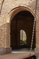 Entrance with a suspension bridge to the artillery caponier. Fragment of the fortification of the...