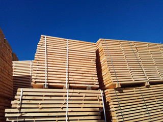 stack of wooden planks at the lumber yard