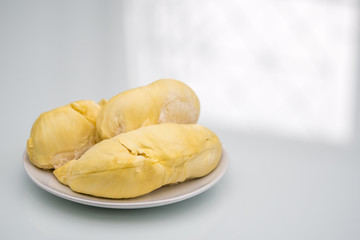 Durian peeled on white plate
