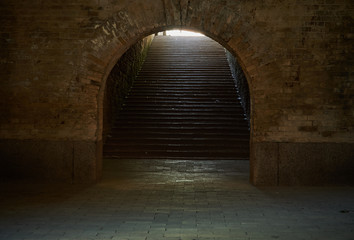 Arched passage with stairs in the fortress. Fragment of the fortification of the nineteenth century...