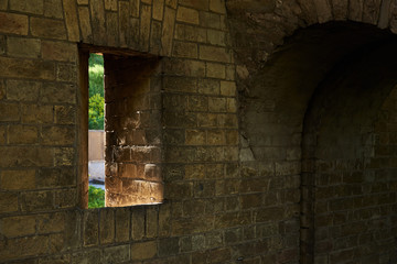 Gun loophole in the brick wall of the fortification of the nineteenth century The Kiev Fortress