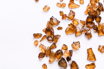 Brown Amber stones on white background