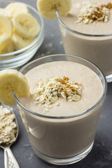 Banana oats smoothie in glasses. 