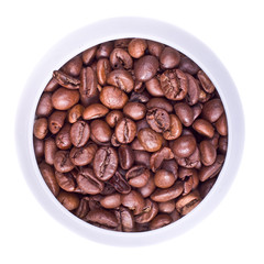Coffee beans in a silver cup