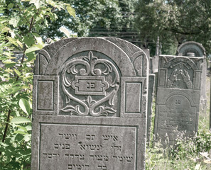 Fototapeta na wymiar Grave slabs at the old Jewish cemetery in Ternopil