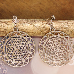 Esoteric earrings with sacred geometry