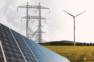Erneuerbare Energie - Windkraftwerk und Solarzelle