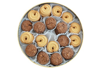 vanilla and chocolate cookies in circle tin box on white background