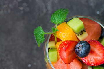 Fresh fruit salad in glass. Copy spase, top view