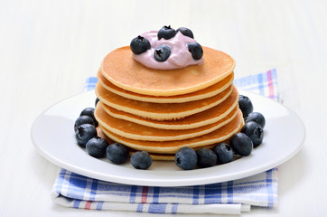 Pancakes with fruit yogurt and blueberry