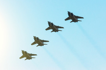 Fototapeta na wymiar Military fighter jet four in the sky.